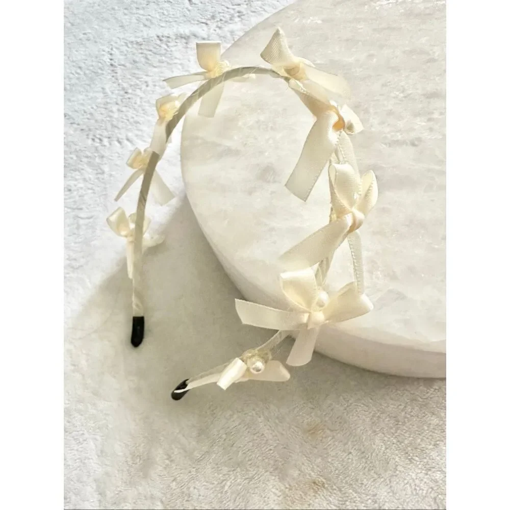 Off-white bow and faux pearl headband